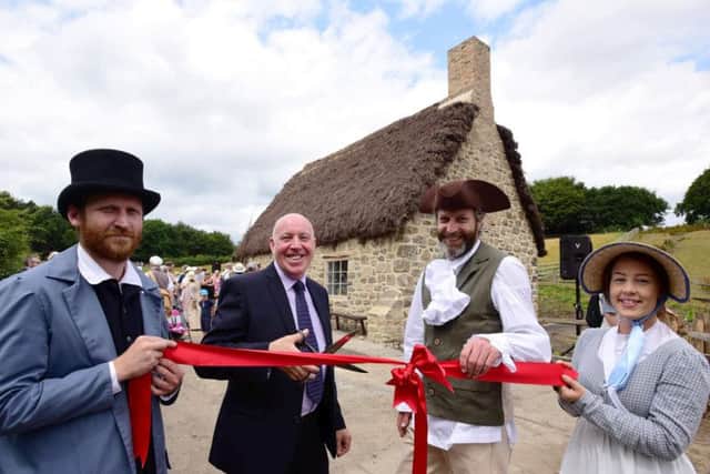(l-r) Matt Bedard, Beamish Joiner; Ivor Crowther, head of Heritage Lottery Fund North East; Richard Evans, Beamishs director, and Shannon Turner-Riley, Remaking Beamish design team assistant, at the official opening of Joe the Quilters cottage at Beamish Museum.