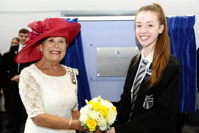 After opening Seaham High School, the Lord-Lieutenant of County Durham Sue Snowdon is presented with flowers by year10 pupil Rhianne High.  Picture by FRANK REID