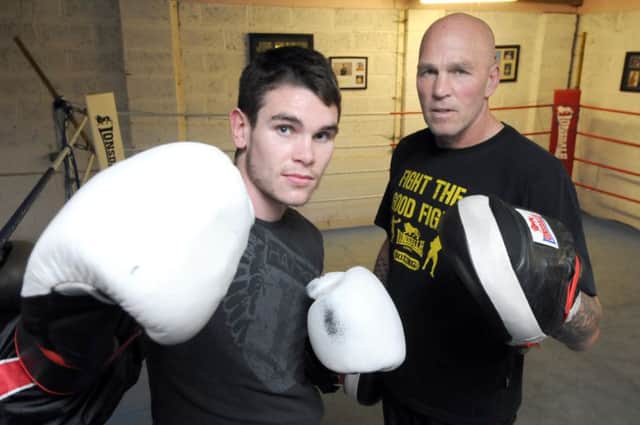 Boxer Tommy Ward in training with coach Neil Fannan
