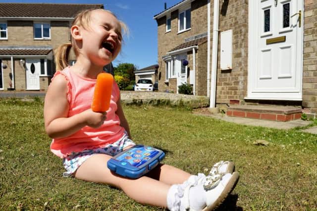 Poppy Preston (2) with her Ice Lolly . Picture by FRANK REID