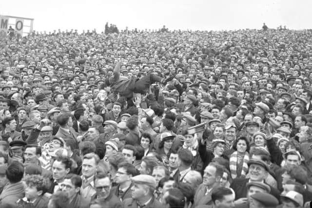 A 1961 Sunderland-Spurs match with a packed crowd.