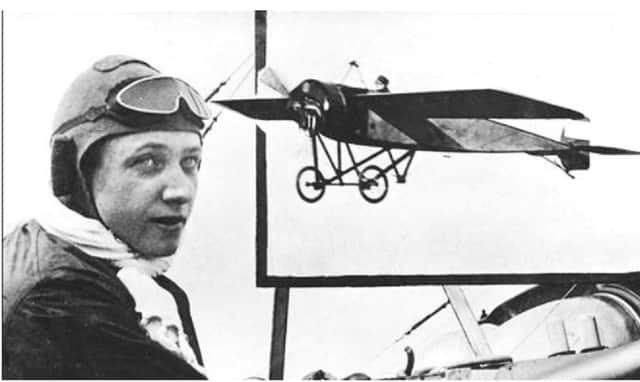 Aviator Gustav Wilhelm Hamel and his aeroplane.