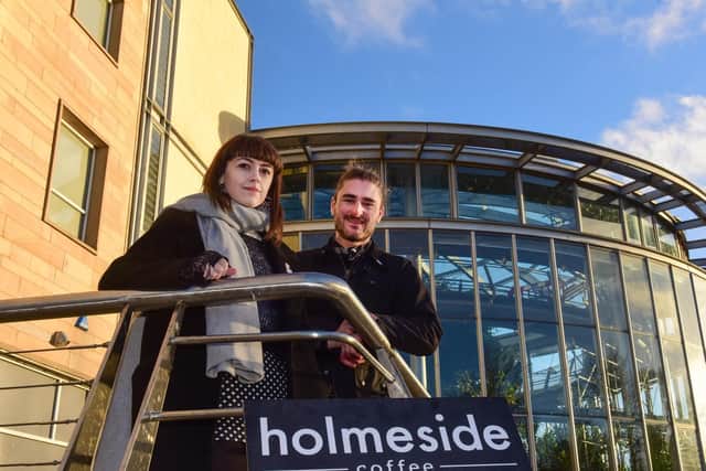 Ashley Bell and Joe Collins, of Holmeside Coffee, outside their new home.