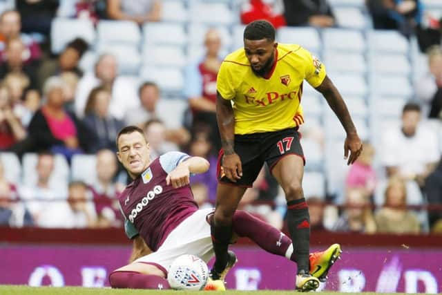 Aston Villa's John Terry (left) and Watford's Jerome Sinclair in action.