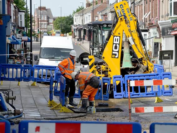 Northumbrian Water engineers remain at the site of the water main burst in Chester Road, Sunderland.