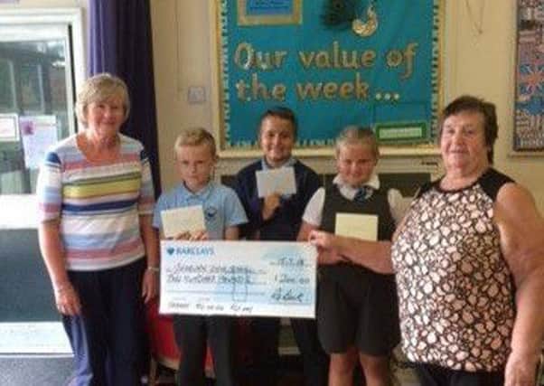 Anne Matters, (left) along with prize winners from Seaburn Dene Primary School and Councillor Margaret Beck.