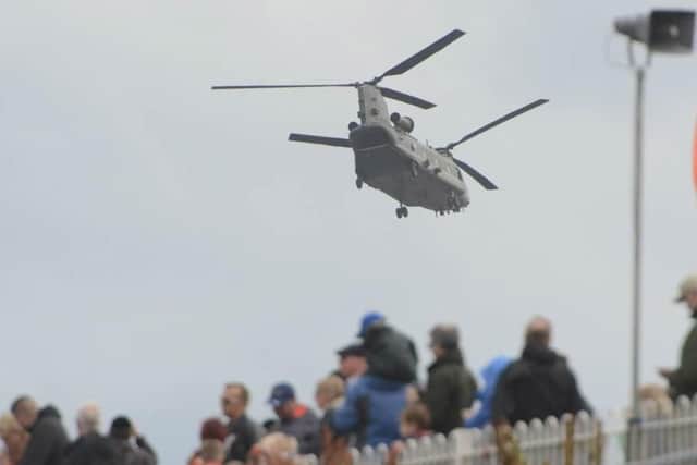The RAF Chinook flies over the crowds who braved the weather at Seaburn on the final day of Sunderland Airshow 2018.