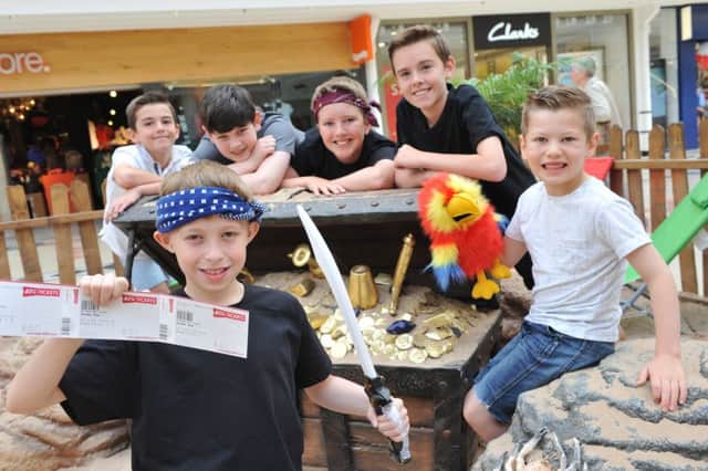 Northern Star Theatre Arts actors Harry Davison, Connell Donaghue, Oliver Ross, Zach Larsen, Harry McDonagh, and Jake Cooper, looking for treasure on the beach at The Bridges Shopping Centre.