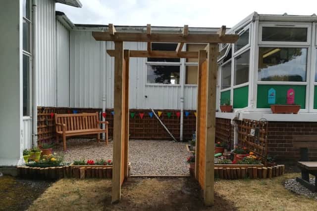 The archway installed in the garden at Acre Rigg Academy as part of its garden project.