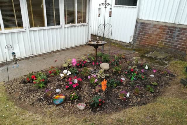 Plants, a birdbath and bird feeders have been put in to the garden space at Acre Rigg Academy.