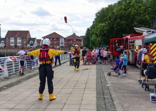 Lifeboat crew demonstrate the Throw Bags for water rescues at the Sunderland RNLI Lifeboat Station and Lifeboat Guild held their annual Ã¢Â¬SHarbour DayÃ¢Â¬Â at Sunderland Marina on Sunday.