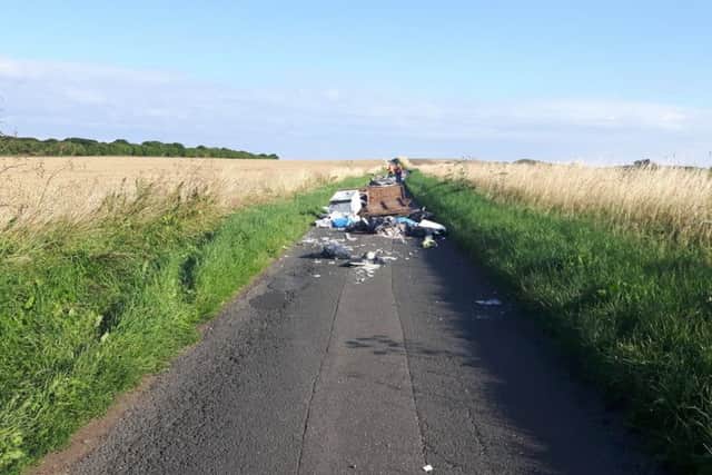 Rubbish left dumped in Foxcover Lane on the morning of Tuesday, August 7, 2018.