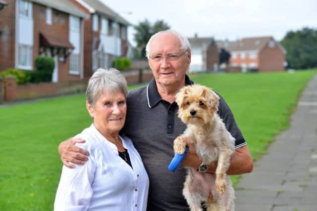 Lilian and Brian Richardson with their dog Pippa.
