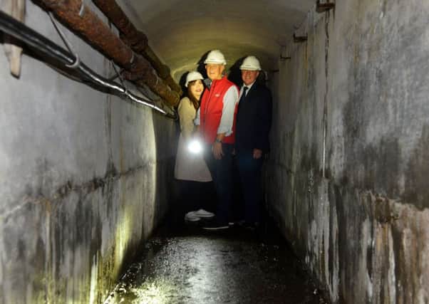 Roker Pier tunnel and lighthouse tours following restoration work 
Coun Rebbecca Atkinson, Chair of Roker Heritage Group Phil Twedell and Head of Heritage Lotery Fund Ivor Crowther