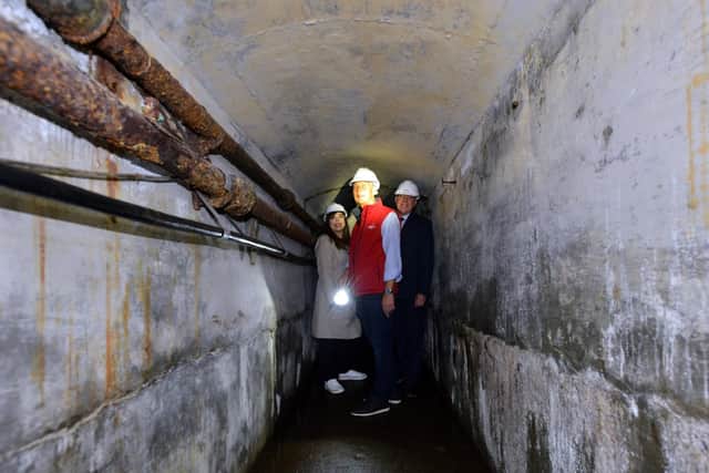 Coun Rebecca Atkinson, Roker Heritage Group chairman Phil Tweddell and head of the Heritage Lottery Fund Ivor Crowther take a tour of the tunnel.