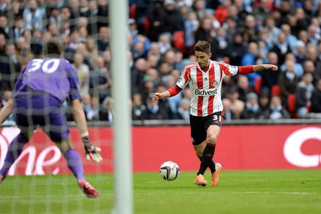 Fabio Borini opens the scoring at Wembley in the 2014 Capital One Cup final