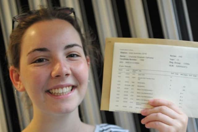 Charlotte Galloway is all smiles with her results.