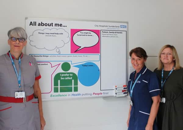 Acute stroke unit Matron Su Lindsay, left, with sister Debbie Hindmarsh and continuous improvement facilitator Fiona Carney with one of the All about me boards.