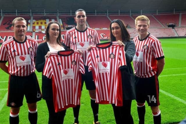 Gemma Lowery with campaign manager Lynne Murphy and players from left Lee Cattermole, John O'Shea and Duncan Watmore.