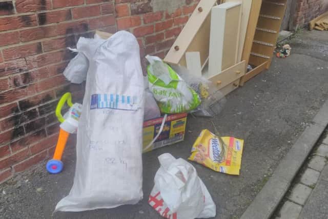 Waste dumped at the back of a property in Northcote Avenue, Hendon