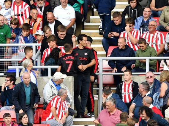 Sunderland fans with new director Juan Satori.