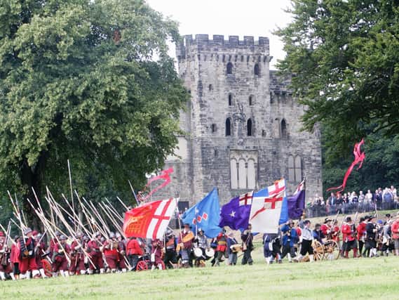 Into Battle: Members of the Sealed Knot Society at the last English Civil War battle re-enactment staged at Hylton Castle.