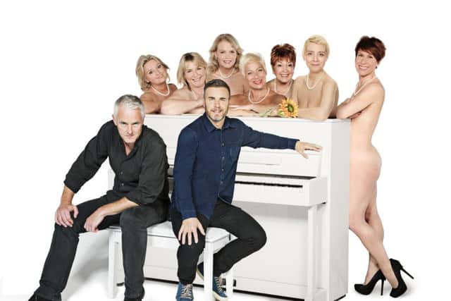 Tim Firth and Gary Barlow with the cast of Calendar Girls the Musical