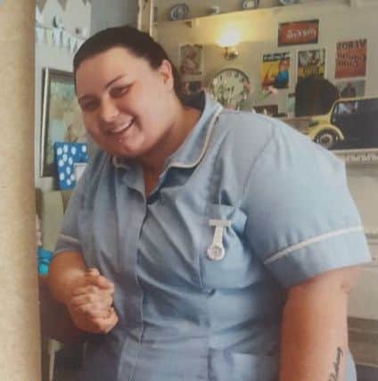 Lyndsey Bruce in her uniform as a care worker.