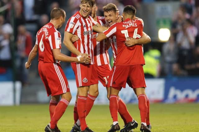 Sunderland celebrate their third goal of the evening