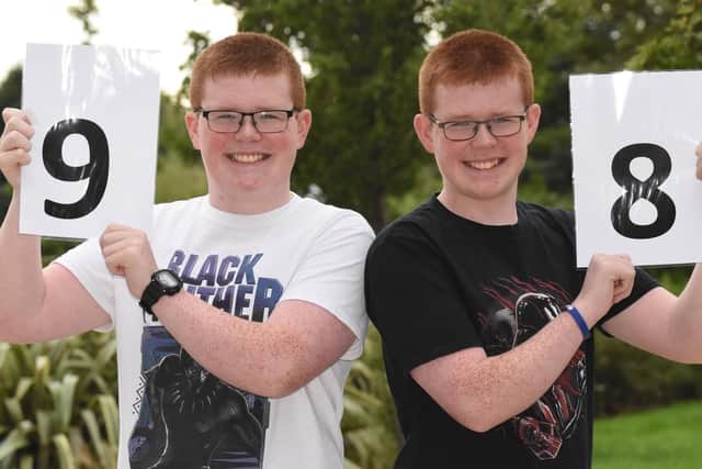Twins Ben and Reece Tilley celebrate their GCSE results.