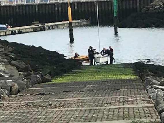 The dinghy is recovered from the river. Picture from Sunderland Coastguard Rescue Team.