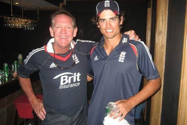 George Summerside with former England cricket captain Alastair Cook.
