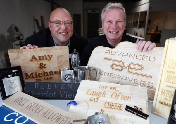 Sunderland Council leader Coun Graeme Miller with ex-Marine Michael  ODonnell, who has set up Advanced Engravers in Washington.