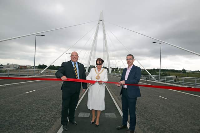 Official opening of the Northern Spire bridge to traffic. A ribbon cutting by Sunderland City Council leader Coun Graeme Miller, Sunderland Mayor Coun Lynda Scanlan and Farran Victor Buyck project director Stephen McCaffrey. Picture: CHRIS BOOTH