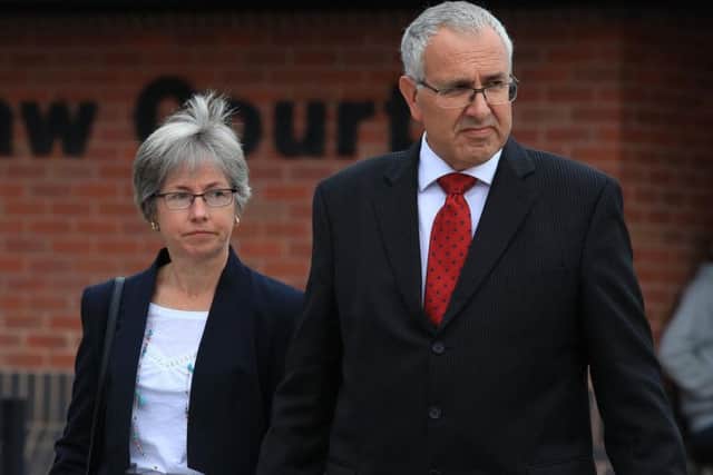 Nigel and Paula Burt, the parents of Durham University student Olivia Burt, who died outside a nightclub, leave South East Northumberland Magistrates' Court, where Paul Hind, 38, admitted trolling relatives of young people who died in tragic circumstances. Photo by Press Association.