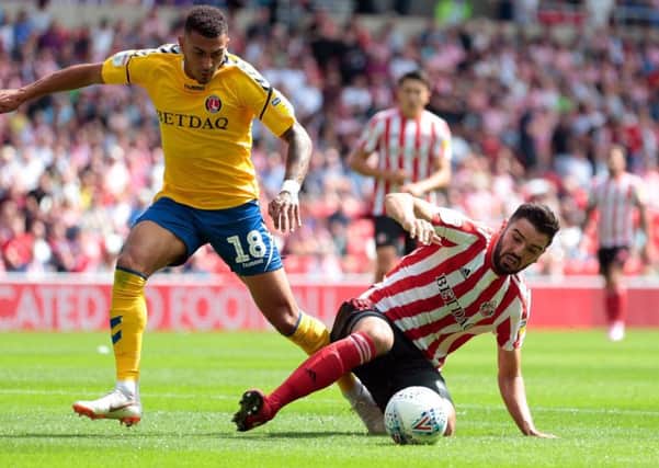 Sunderland's Alim Ozturk (right) and Charlton Athletic's Karlan Ahearne-Grant battle for the ball.