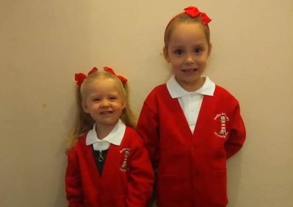 Back to school. Ellie Ward going into nursery and Amelia Ward going into Year 2 at Redby Primary School. Picture: Natalie Ward.