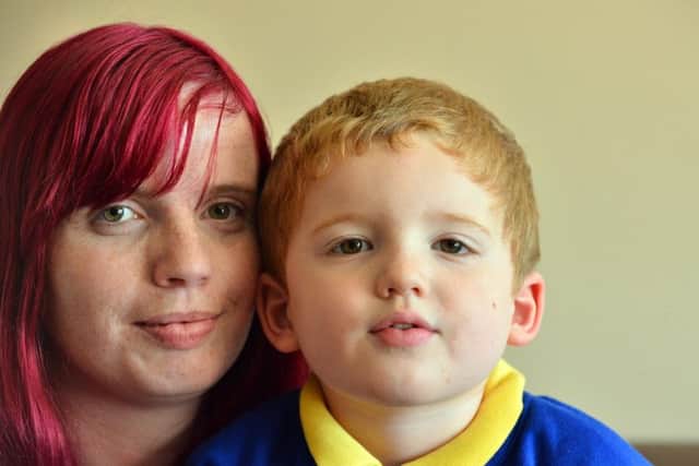 Amy Hossack with her autistic son Aaron, four.