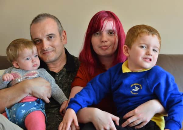 Amy Hossack is taking on an alcohol-free fundraiser to raise cash for Include 'in' Autism. She's pictured with partner Paul Rochester and their son Aaron and daughter Poppy.