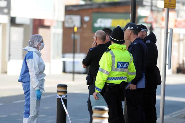 Police and forensics officers in Sea Road, Sunderland.