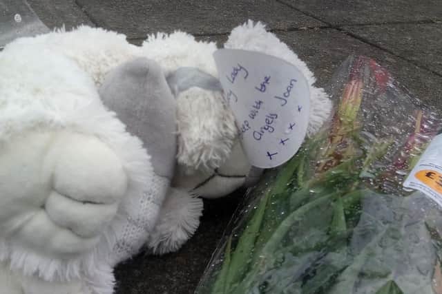 Floral tributes left at the scene on Sea Road