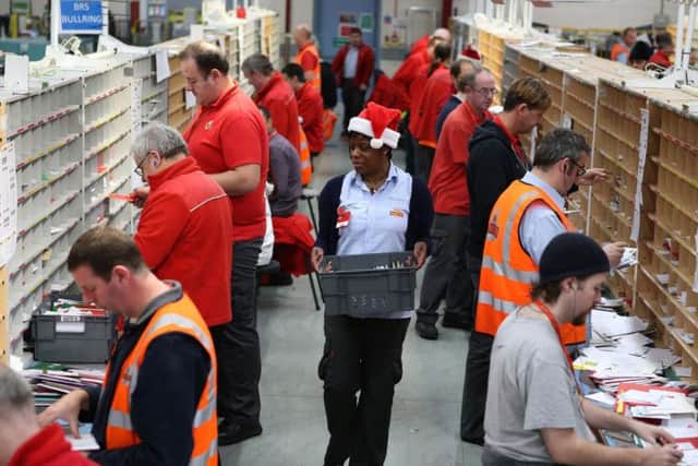 Royal Mail is recruiting Christmas casual workers to help deal with the seasonal increase in post and parcels. Pic: Andrew Milligan/PA Wire.