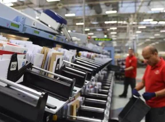 Royal Mail is recruiting extra staff for the busy Christmas period. Pic: Joe Giddens/PA Wire.