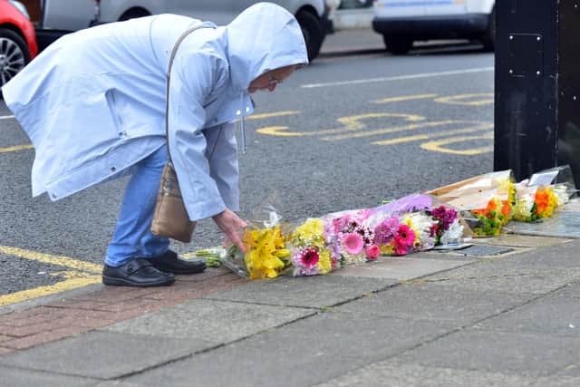Flowers are left in Sea Road in memory of Joan Hoggett