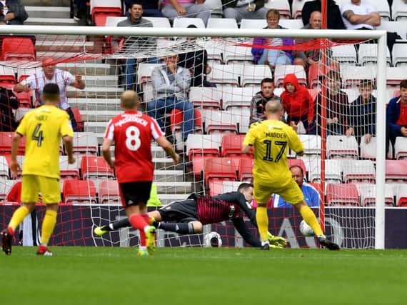 Jon McLaughlin's penalty save secured a point for Sunderland