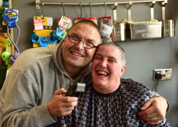 Margaret Glover, who had breast cancer 10 years ago, had her head shaved by husband Gary for the Macmillan Brave the Shave campaign at K9 Coffee House, Front Street, Fence Houses.