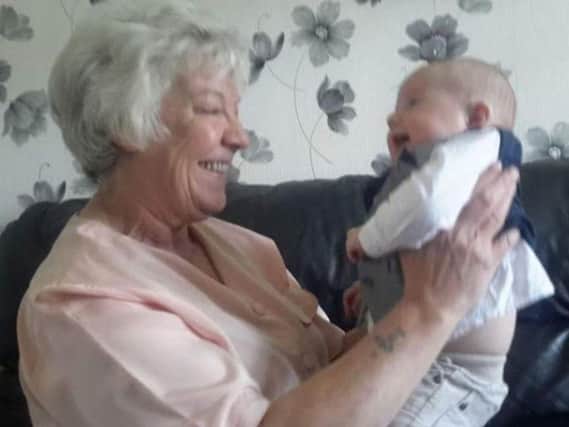 Joan Hoggett pictured with a great-grandchild.