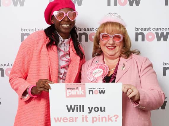 MP Sharon Hodgson poses in pink with former Olympain Donna Fraser to support Breast Cancer Nows flagship 'wear it pink' fundraiser.