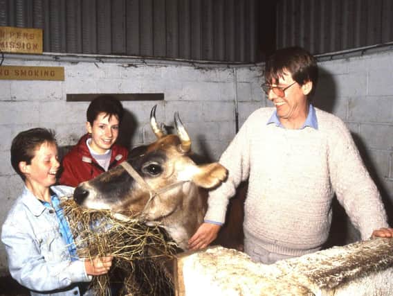 Picture from 1988: Pupils from Monwearmouth Comprehensive needed at least 400 to buy a cow which will be flown to Africa as part of the Send a Cow to Africa scheme. Mark Watson and Fiona Parkin, both 12, with Clover the Jersey Cow and Peter Kimmitt, manager of Southwick Village Farm.