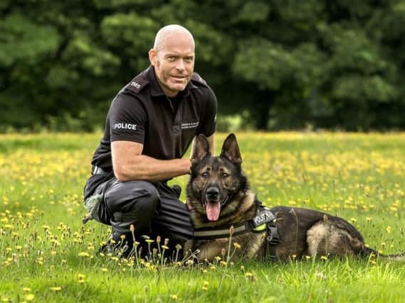 Kaizer with his owner PC Ian Squire. Please credit Grant Humphreys.